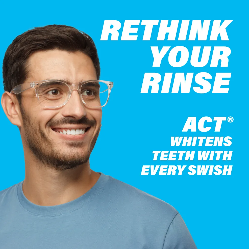 Packaging of ACT® Whitening Mouthwash bottle and benefit statements.